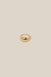 Gold ring on a beige background