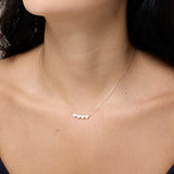 Four White and Yellow Gold Hearts Necklace
